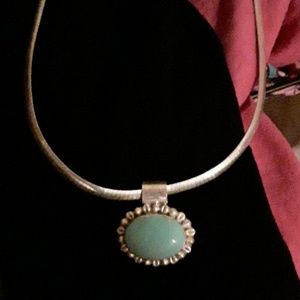 Large turquoise pendant on Omega chain